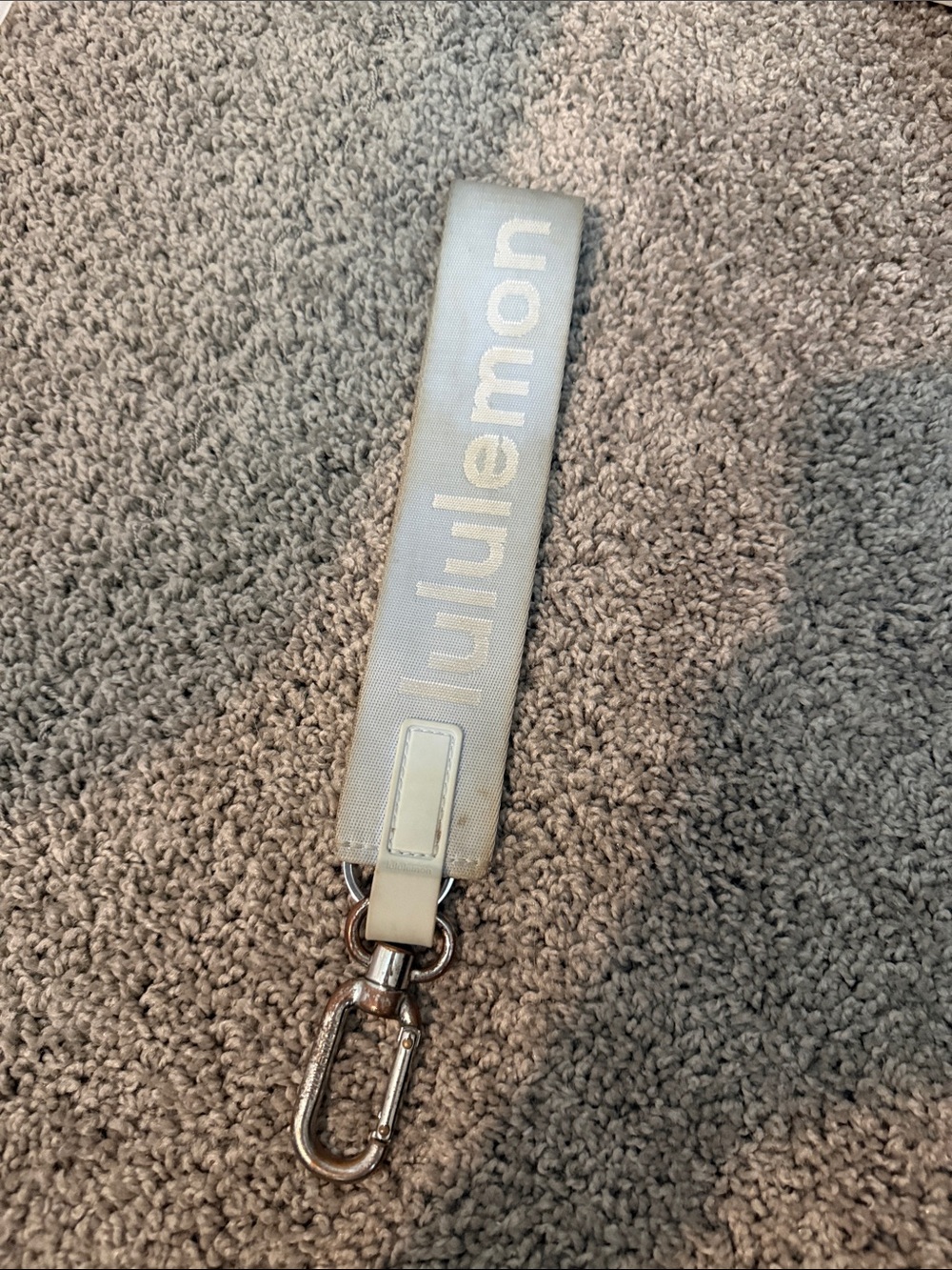 lululemon athletica light blue wristlet with silver clip